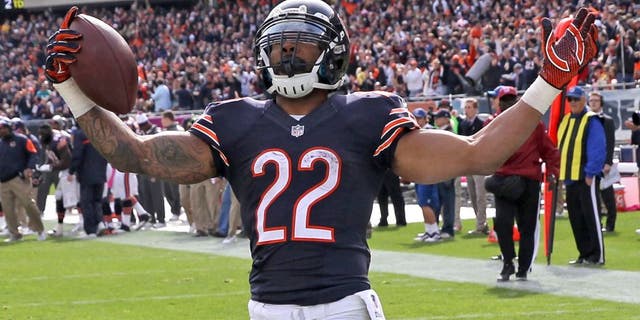 CHICAGO, IL - OCTOBER 19: Matt Forte #22 of the Chicago Bears celebrates his touchdown during the third quarter of a game against the Miami Dolphins at Soldier Field on October 19, 2014 in Chicago, Illinois. (Photo by Jonathan Daniel/Getty Images)