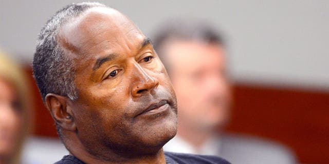 LAS VEGAS, NV - MAY 17: O.J. Simpson watches his former defense attorney Yale Galanter testify during an evidentiary hearing in Clark County District Court on May 17, 2013 in Las Vegas, Nevada. Simpson, who is currently serving a nine-to-33-year sentence in state prison as a result of his October 2008 conviction for armed robbery and kidnapping charges, is using a writ of habeas corpus to seek a new trial, claiming he had such bad representation that his conviction should be reversed. (Photo by Ethan Miller/Getty Images)