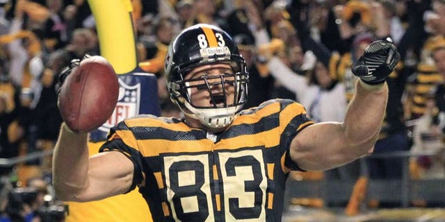 Oct 26, 2014; Pittsburgh, PA, USA; Pittsburgh Steelers tight end Heath Miller (83) celebrates after catching an eleven yard touchdown pass against the Indianapolis Colts during the fourth quarter at Heinz Field. The Steelers won 51-34. Mandatory Credit: Charles LeClaire-USA TODAY Sports