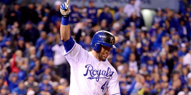 Oct 27, 2015; Kansas City, MO, USA; Kansas City Royals left fielder Alex Gordon (4) celebrates after hitting a solo home run against the New York Mets in the 9th inning in game one of the 2015 World Series at Kauffman Stadium. Mandatory Credit: Jeff Curry-USA TODAY Sports