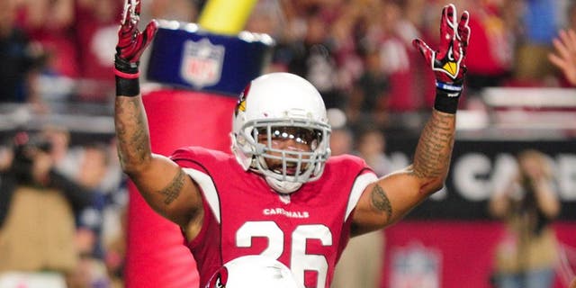 Oct 26, 2015; Glendale, AZ, USA; Arizona Cardinals strong safety Tony Jefferson (22) celebrates after making an interception as free safety Rashad Johnson (26) looks on during the second half against the Baltimore Ravens at University of Phoenix Stadium. Mandatory Credit: Matt Kartozian-USA TODAY Sports