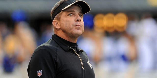 Oct 25, 2015; Indianapolis, IN, USA; New Orleans Saints head coach Sean Payton looks at the scoreboard during the final minutes of their game against the Indianapolis Colts at Lucas Oil Stadium. The Saints went on to win the game, 27-21. Mandatory Credit: Thomas J. Russo-USA TODAY Sports