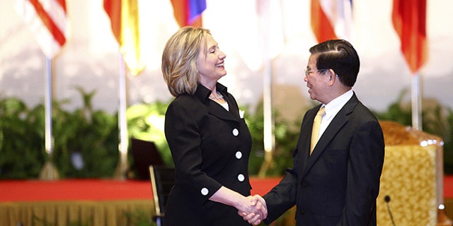Oct. 30: Secretary of State Hillary Rodham Clinton, left, is greeted by Vietnamese President Nguyen Minh Triet on the sidelines of the 17th ASEAN Summit in Hanoi, Vietnam.