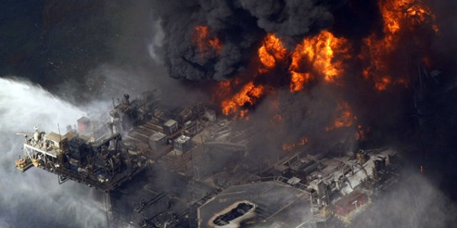 Apr. 21, 2010: The Deepwater Horizon oil rig is seen burning in the Gulf of Mexico.