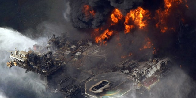 Apr. 21, 2010: The Deepwater Horizon oil rig is seen burning in the Gulf of Mexico.