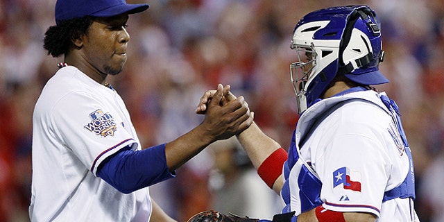 Oct. 30: Texas Rangers' Neftali Feliz is congratulated by catcher Bengie Molina after Game 3 of baseball's World Series against the San Francisco Giants.