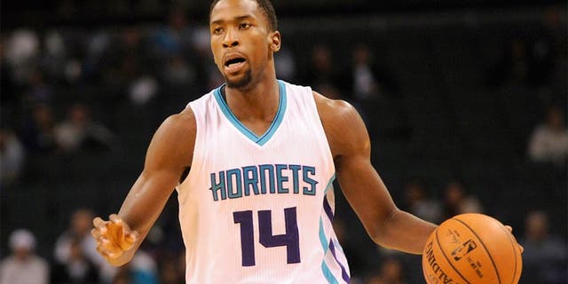 Oct 23, 2014; Charlotte, NC, USA; Charlotte Hornets forward Michael Kidd-Gilchrist (14) during the first half of the game against the Indiana Pacers at Time Warner Cable Arena. Mandatory Credit: Sam Sharpe-USA TODAY Sports