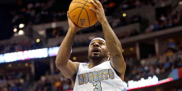Oct 29, 2014; Denver, CO, USA; Denver Nuggets guard Ty Lawson (3) shoots the ball during the first half against the Detroit Pistons at Pepsi Center. Mandatory Credit: Chris Humphreys-USA TODAY Sports