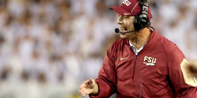 Oct 24, 2015; Atlanta, GA, USA; Florida State Seminoles head coach Jimbo Fisher argues a call with an official during the fourth quarter of their game against the Georgia Tech Yellow Jackets at Bobby Dodd Stadium. Georgia Tech won 22-16. Mandatory Credit: Jason Getz-USA TODAY Sports