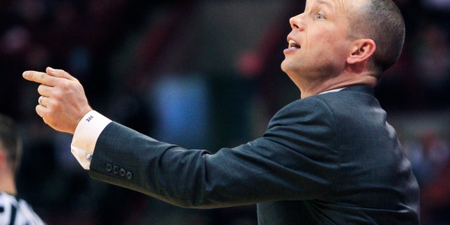 Winthrop head coach Pat Kelsey gestures to his team against Ohio State during the first half of an NCAA college basketball game, Tuesday, Dec. 18, 2012, in Columbus, Ohio. Ohio State won 65-55. (AP Photo/Jay LaPrete)