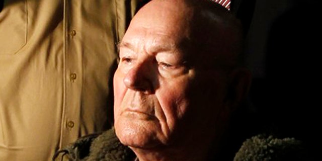 FILE- Retired U.S. auto worker John Demjanjuk waits in a courtroom in Munich. A new precedent set by the conviction of Demjanjuk allows prosecutors to reopen hundreds of similar cases.