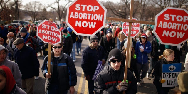 WASHINGTON, DC - JANUARY 24:  Tens of thousands of anti-abortion demonstrators march along Constitution Avenue toward the Supreme Court during the March for Life January 24, 2011 in Washington, DC. The annual march marks the anniversary of the landmark Roe v. Wade decision by the court that made abortion legal in the United States.  (Photo by Chip Somodevilla/Getty Images)