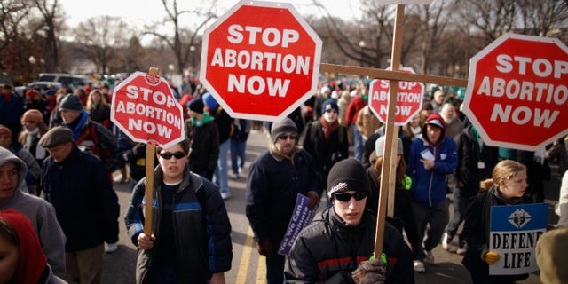 WASHINGTON, DC - JANUARY 24: Tens of thousands of anti-abortion demonstrators march along Constitution Avenue toward the Supreme Court during the March for Life January 24, 2011 in Washington, DC. The annual march marks the anniversary of the landmark Roe v. Wade decision by the court that made abortion legal in the United States. (Photo by Chip Somodevilla/Getty Images)
