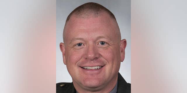 FILE – This undated file photo provided by the Ohio State Highway Patrol shows Lt. William Elschlager, commander of the Marietta Patrol Post in Marietta, Ohio. Elschlager, a former Ohio trooper fired after he was accused of stalking a subordinate's wife after an affair, was scheduled for arraignment Wednesday, Oct. 19, 2016, on new charges of finding or keeping personal information about other women obtained from a law enforcement database without authorization. (Ohio State Highway Patrol via AP, File)