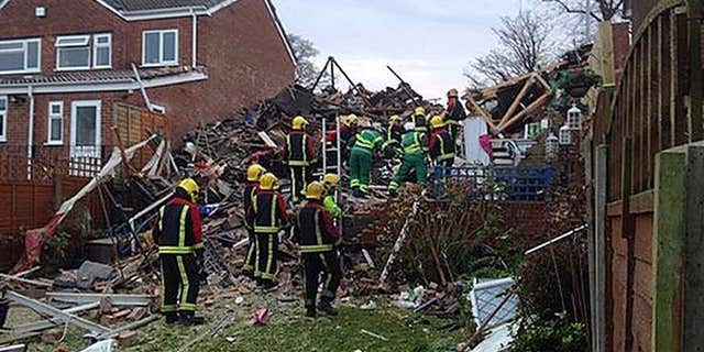 A woman rescued after a suspected gas blast destroyed her home was saved by her washing machine. (Sky News)