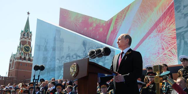 Russian President Vladimir Putin speaks during the Victory Day military parade marking 71 years after the victory in WWII, in Moscow's Red Square.