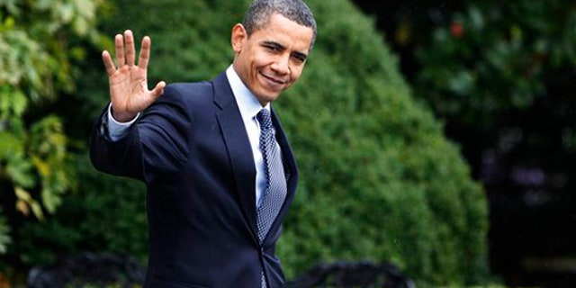 Sunday: President Obama waves as he leaves the White House for a day trip to New Jersey to campaign for Gov. Jon Corzine. (AP)
