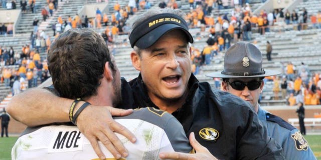 Nov 10, 2012; Knoxville, TN, USA; Missouri Tigers head coach Gary Pinkel celebrates with Missouri wide receiver T.J. Moe (28) after defeating the Tennessee Volunteers 51-48 in quadruple overtime at Neyland Stadium. Missouri defeated Tennessee . Mandatory Credit: Jim Brown-USA TODAY Sports