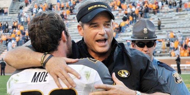 Nov 10, 2012; Knoxville, TN, USA; Missouri Tigers head coach Gary Pinkel celebrates with Missouri wide receiver T.J. Moe (28) after defeating the Tennessee Volunteers 51-48 in quadruple overtime at Neyland Stadium. Missouri defeated Tennessee . Mandatory Credit: Jim Brown-USA TODAY Sports