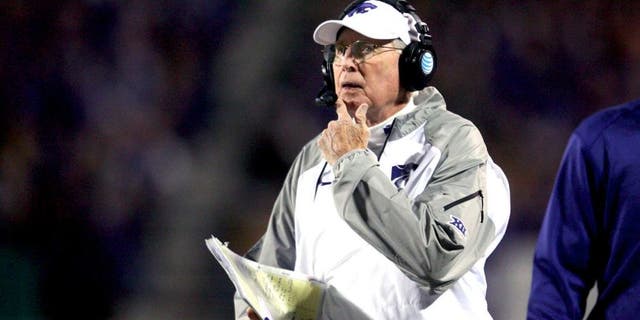 Nov 1, 2014; Manhattan, KS, USA; Kansas State Wildcats head coach Bill Snyder looks at the scoreboard during first-half action against the Oklahoma State Cowboys at Bill Snyder Family Stadium. Mandatory Credit: Scott Sewell-USA TODAY Sports