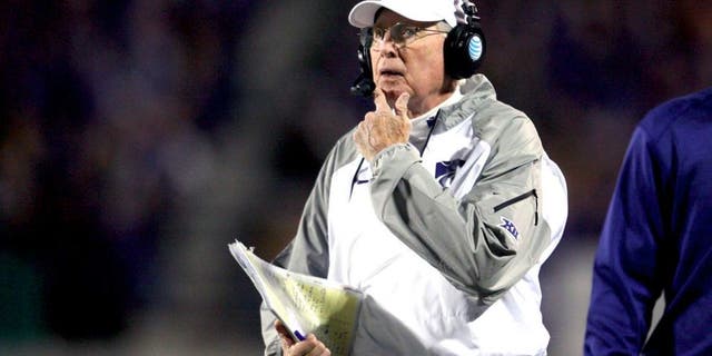 Nov 1, 2014; Manhattan, KS, USA; Kansas State Wildcats head coach Bill Snyder looks at the scoreboard during first-half action against the Oklahoma State Cowboys at Bill Snyder Family Stadium. Mandatory Credit: Scott Sewell-USA TODAY Sports