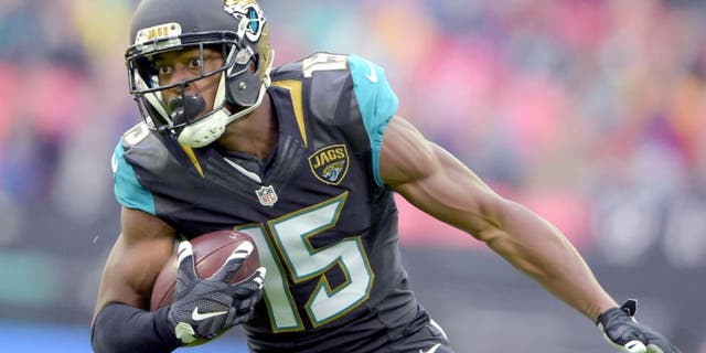Oct 25, 2015; London, United Kingdom; Jacksonville Jaguars receiver Allen Robinson (15) carries the ball against the Buffalo Bills during NFL International Series game at Wembley Stadium. Mandatory Credit: Kirby Lee-USA TODAY Sports