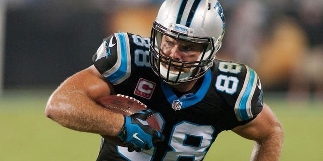 Oct 25, 2015; Charlotte, NC, USA; Carolina Panthers tight end Greg Olsen (88) runs after making a catch during the third quarter against the Philadelphia Eagles at Bank of America Stadium. Carolina defeated Philadelphia 27-16. Mandatory Credit: Jeremy Brevard-USA TODAY Sports
