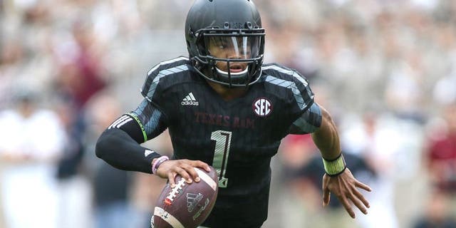 Oct 31, 2015; College Station, TX, USA; Texas A&M Aggies quarterback Kyler Murray (1) scrambles with the ball during the first quarter against the South Carolina Gamecocks at Kyle Field. Mandatory Credit: Troy Taormina-USA TODAY Sports