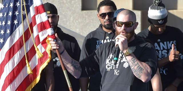 Nov 3, 2015; Kansas City, MO, USA; Kansas City Royals player Jonny Gomes speaks to fans during the World Series victory celebration on stage at Union Station. Mandatory Credit: Denny Medley-USA TODAY Sports