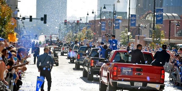 KANSAS CITY, MO -NOVEMBER 3: Members of the Kansas City Royals make their way through the steers of downtown during a parade to celebrate their World Series victory on November 3, 2015 in Kansas City, Missouri. (Photo by Ed Zurga/Getty Images)