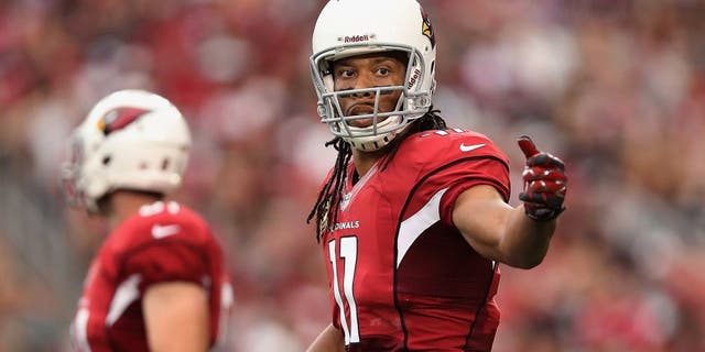 GLENDALE, AZ - OCTOBER 27: Wide receiver Larry Fitzgerald #11 of the Arizona Cardinals during the NFL game against the Atlanta Falcons at the University of Phoenix Stadium on October 27, 2013 in Glendale, Arizona. The Cardinals defeated the Falcons 27-13. (Photo by Christian Petersen/Getty Images) *** Local Caption *** Larry Fitzgerald