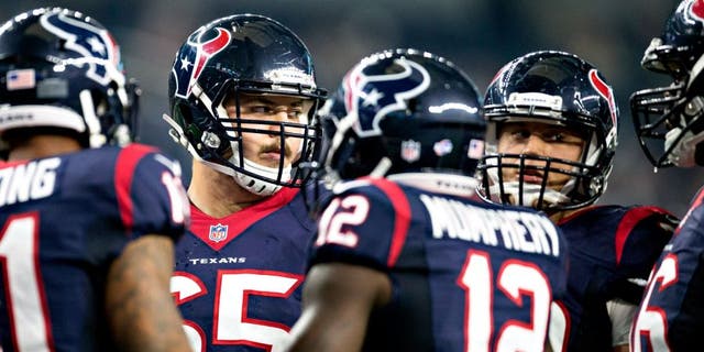 ARLINGTON, TX - SEPTEMBER 3: Greg Mancz #65 of the Houston Texans in the huddle during a preseason game against the Dallas Cowboys at AT&amp;T Stadium on September 3, 2015 in Arlington, Texas. The Cowboys defeated the Texans 21-14. (Photo by Wesley Hitt/Getty Images)