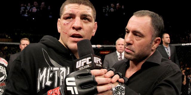 LAS VEGAS, NV - FEBRUARY 04: Nick Diaz (L) is interviewed by Joe Rogan after his victory over Nick Diaz during the UFC 143 event at Mandalay Bay Events Center on February 4, 2012 in Las Vegas, Nevada. (Photo by Josh Hedges/Zuffa LLC/Zuffa LLC via Getty Images)