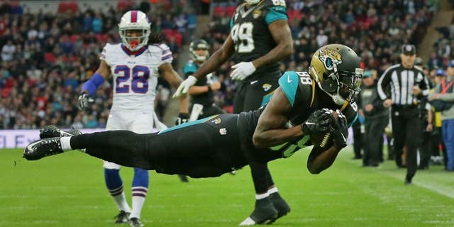 Jacksonville Jaguars wide receiver Allen Hurns (88) catches the ball for a touchdown during the NFL game between Buffalo Bills and Jacksonville Jaguars at Wembley Stadium in London, Sunday, Oct. 25, 2015. (AP Photo/Tim Ireland)