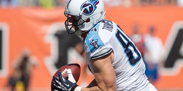 Sep 21, 2014; Cincinnati, OH, USA; Tennessee Titans tight end Taylor Thompson (84) is unable to make a catch against the Cincinnati Bengals at Paul Brown Stadium. The Bengals won 33-7. Mandatory Credit: Aaron Doster-USA TODAY Sports