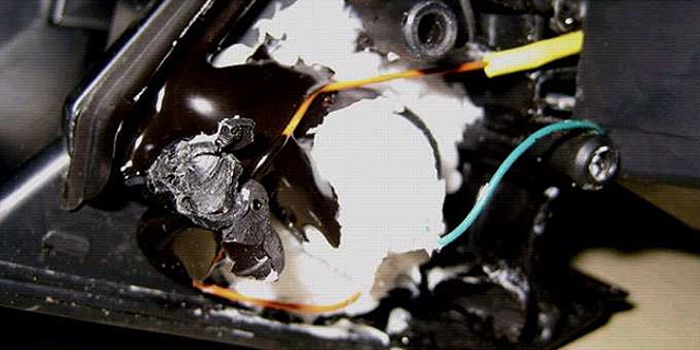 Nov. 6: This photo released by Interpol shows explosive material secreted in a printer cartridge which was shipped via commercial cargo aircraft from Yemen with final destination the U.S.