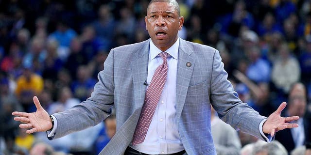 November 5, 2014; Oakland, CA, USA; Los Angeles Clippers head coach Doc Rivers reacts against the Golden State Warriors during the fourth quarter at Oracle Arena. The Warriors defeated the Clippers 121-104. Mandatory Credit: Kyle Terada-USA TODAY Sports