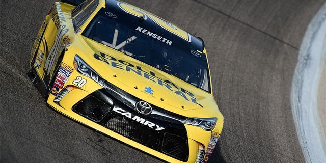 Matt Kenseth, driver of the #20 Dollar General Toyota, drives during qualifying for the NASCAR Sprint Cup Series Duck Commander 500 at Texas Motor Speedway on April 10, 2015 in Fort Worth, Texas.