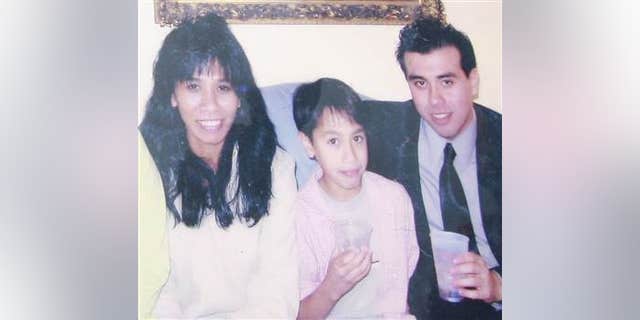 A family photo shows Gerfa Yeatts Lunsmann, left, and her son Kevin Eric Lunsmann, with Gerfa's unidentified husband.