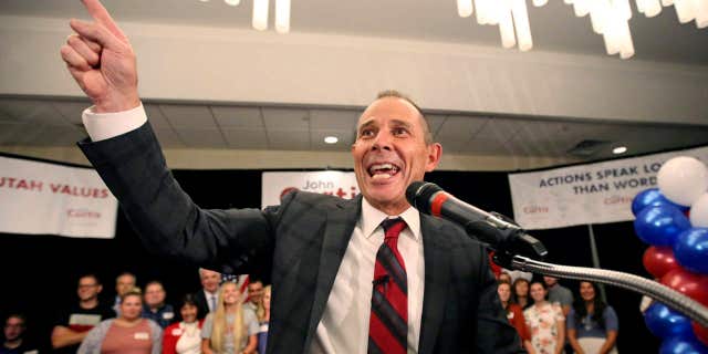 FILE - In this Aug. 15, 2017, file photo, Provo Mayor John Curtis celebrates after winning Utah's Republican primary to become the favorite to fill the U.S.