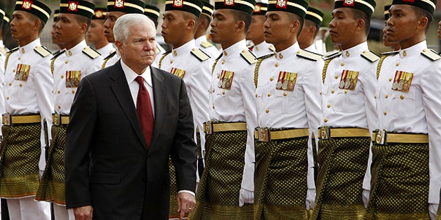 Nov. 9: Defense Secretary Robert Gates inspects the guard of honor during a welcoming ceremony at Malaysia's Ministry of Defense in Kuala Lumpur, Malaysia.