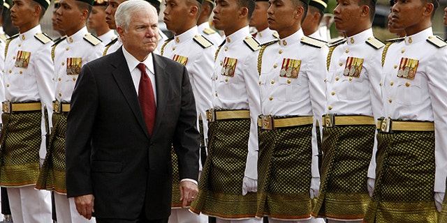 Nov. 9: Defense Secretary Robert Gates inspects the guard of honor during a welcoming ceremony at Malaysia's Ministry of Defense in Kuala Lumpur, Malaysia.