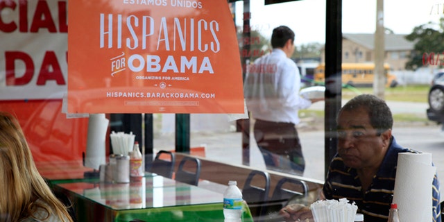 Oct. 26, 2012: Spanish language election campaign signs promoting President Barack Obama hang on the windows at Lechonera El Barrio Restaurant in Orlando, Fla. Hispanics supported President Barack Obama over Republican Mitt Romney by almost 3-to-1 and put Republicans on notice they must take real steps to win over the nations largest minority group if they want to win the presidency again.