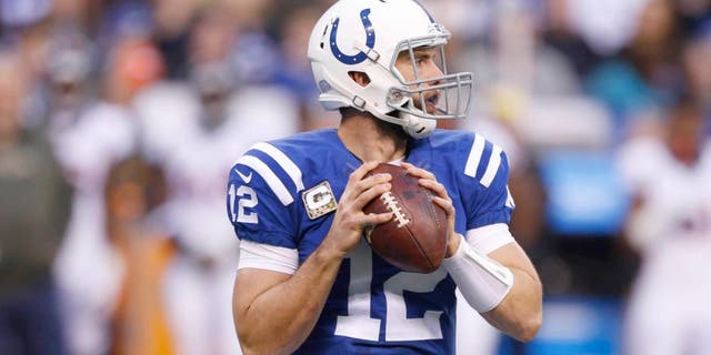 Nov 8, 2015; Indianapolis, IN, USA; Indianapolis Colts quarterback Andrew Luck (12) throws a pass against the Denver Broncos at Lucas Oil Stadium. Mandatory Credit: Brian Spurlock-USA TODAY Sports