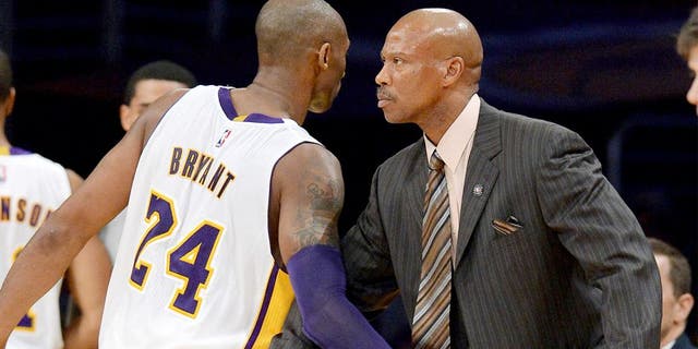 Nov 9, 2014; Los Angeles, CA, USA; Los Angeles Lakers guard Kobe Bryant (24) and head coach Byron Scott in the second half of the game against the Charlotte Hornets at Staples Center. Lakers won 107-92. Mandatory Credit: Jayne Kamin-Oncea-USA TODAY Sports
