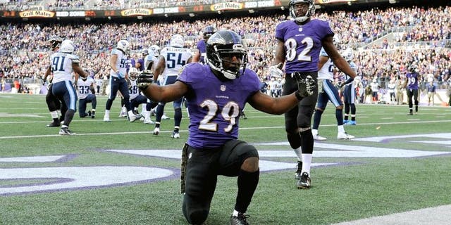 BALTIMORE, MD - NOVEMBER 09: Running back Justin Forsett #29 of the Baltimore Ravens celebrates after scoring a third quarter touchdown against the Tennessee Titans at M&T Bank Stadium on November 9, 2014 in Baltimore, Maryland. (Photo by Patrick Smith/Getty Images)