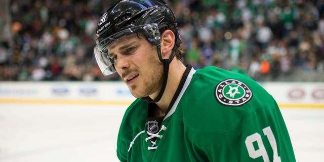 Nov 8, 2014; Dallas, TX, USA; Dallas Stars center Tyler Seguin (91) reacts to his team giving up the lead to the San Jose Sharks at the American Airlines Center. Seguin scores a hat trick. The Sharks defeated the Stars 5-3. Mandatory Credit: Jerome Miron-USA TODAY Sports