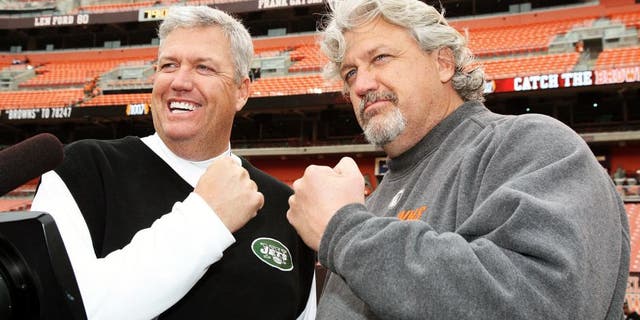 CLEVELAND - NOVEMBER 14: Head Coach Rex Ryan of the New York Jets meets with his twin brother, Defensive Coordinator Rob Ryan of the Cleveland Browns when the Cleveland Browns host the New York Jets at Cleveland Browns Stadium on November 14, 2010 in Cleveland, Ohio. Jets beat the Browns, 26-20, in Overtime. (Photo by Al Pereira/New York Jets/Getty Images) .