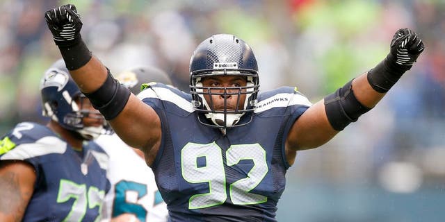 SEATTLE, WA - SEPTEMBER 22: Defensive tackle Brandon Mebane #92 of the Seattle Seahawks celebrates a tackle in the first half against the Jacksonville Jaguars at CenturyLink Field on September 22, 2013 in Seattle, Washington. (Photo by Otto Greule Jr/Getty Images)