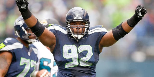 SEATTLE, WA - SEPTEMBER 22: Defensive tackle Brandon Mebane #92 of the Seattle Seahawks celebrates a tackle in the first half against the Jacksonville Jaguars at CenturyLink Field on September 22, 2013 in Seattle, Washington. (Photo by Otto Greule Jr/Getty Images)